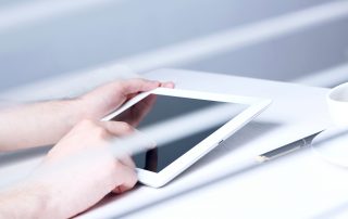 hearing impaired person accesses a website using a tablet. As the number of Federal Website Accessibility lawsuits in the US continues to grow, it will be increasingly important to get your website in compliance.