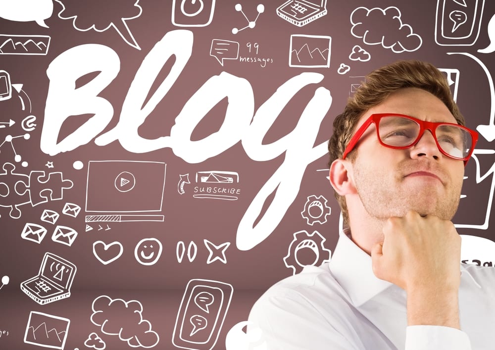 Image of man thinking about blog to represent how much paying someone to write a blog is worth