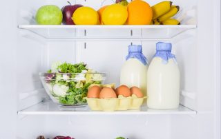 Open refrigerator with fresh milk, eggs and veggies. Understanding the lifespan on content on different platforms is helpful for keeping your content fresh.