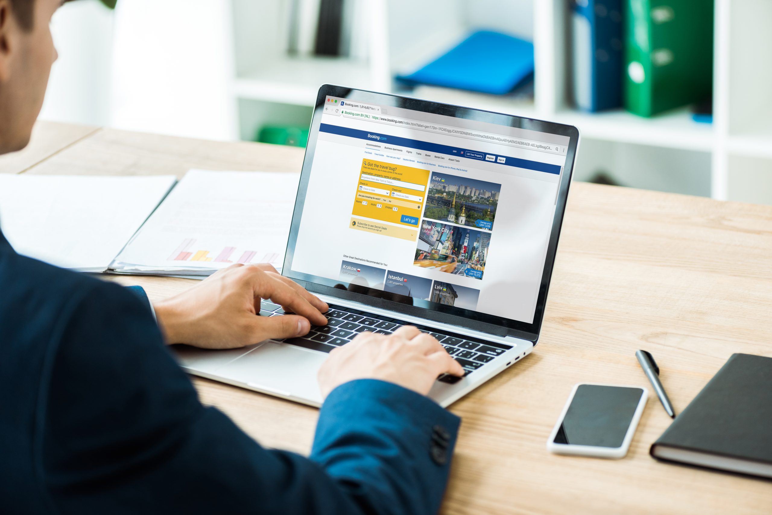 Depositphotos_298091570_xl-2015 Digital marketer at desk, working on laptop