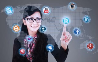 Close-up of businesswoman touching social media applications on a virtual global computer.