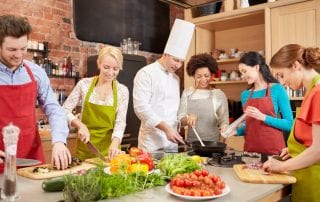 Chef from a local restaurant conducting a cooking class. Promotion of local events can raise awareness, increase site visits and even improve local rankings.