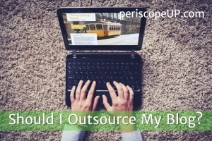 Person typing on laptop to represent a person creating an outsourced blog post