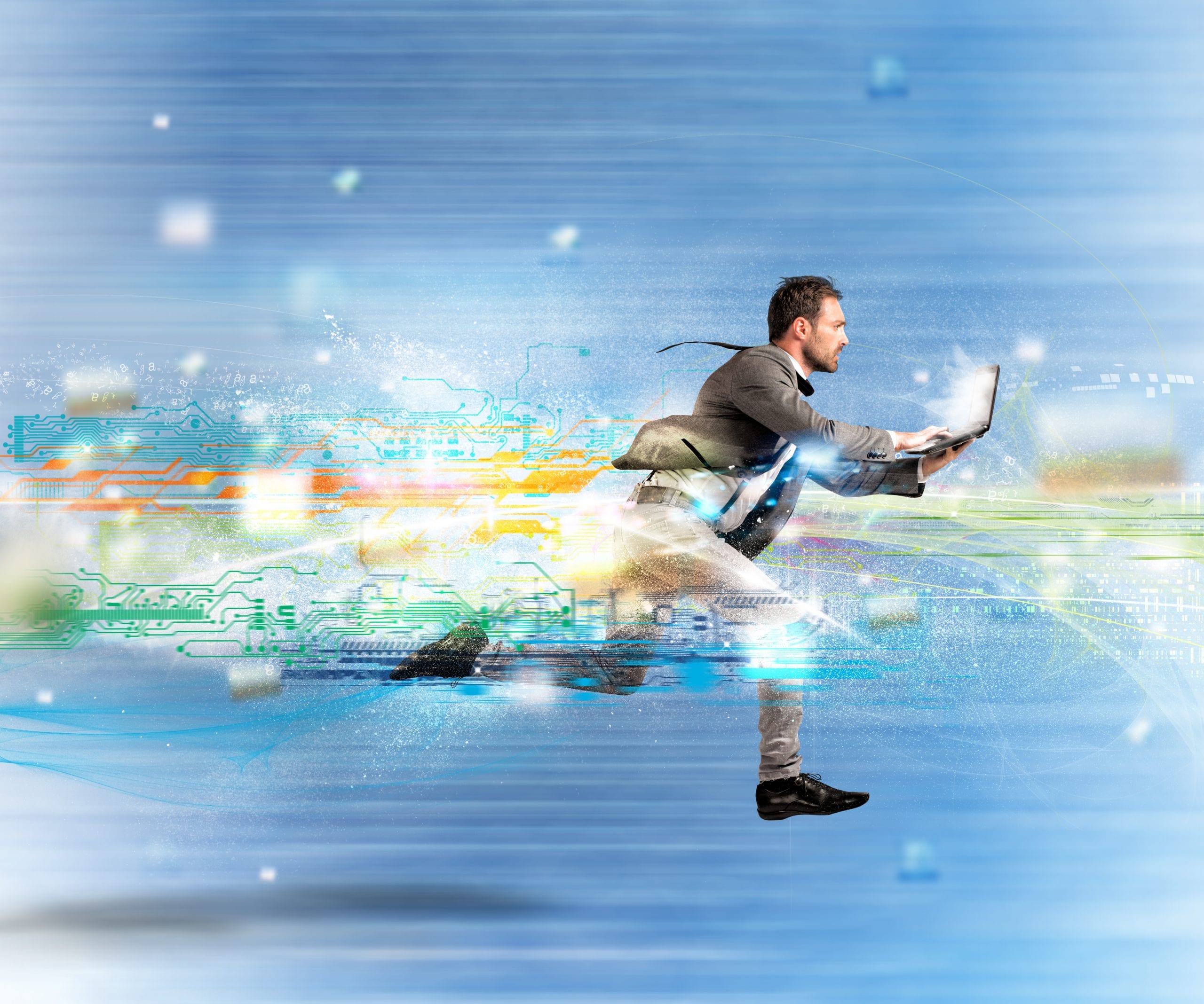 Businessman in a suit with a laptop running fast signifying website loading speed.