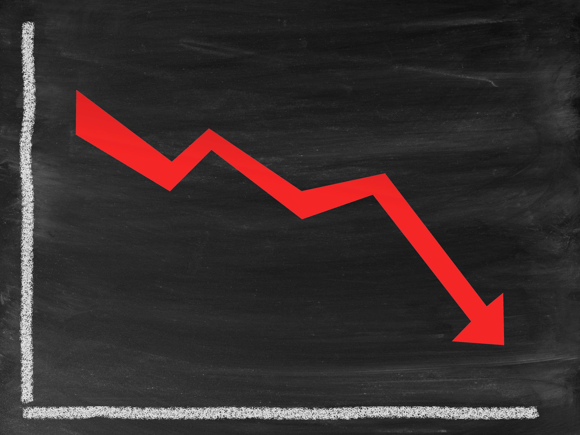 line graph with a red arrow going down